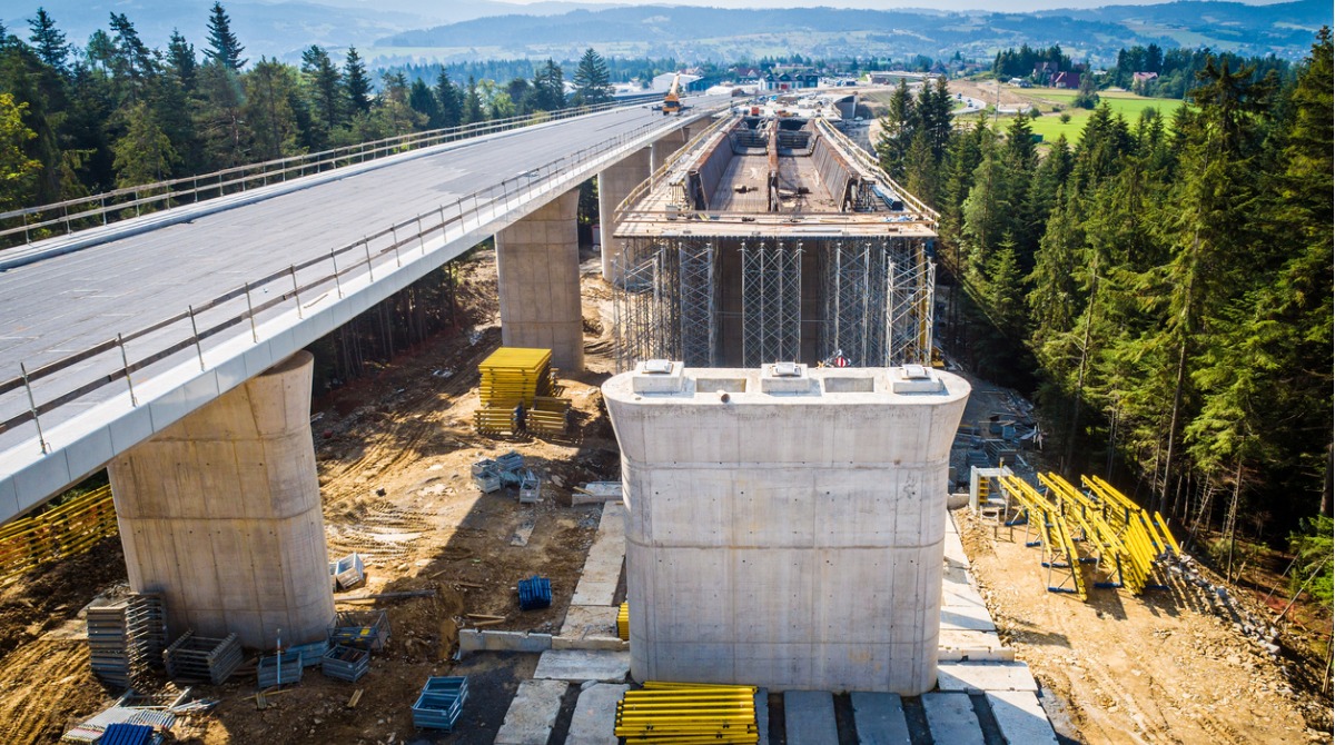 drone-view-on-highway-bridge-in-construction-picture-id1130507480 (1)